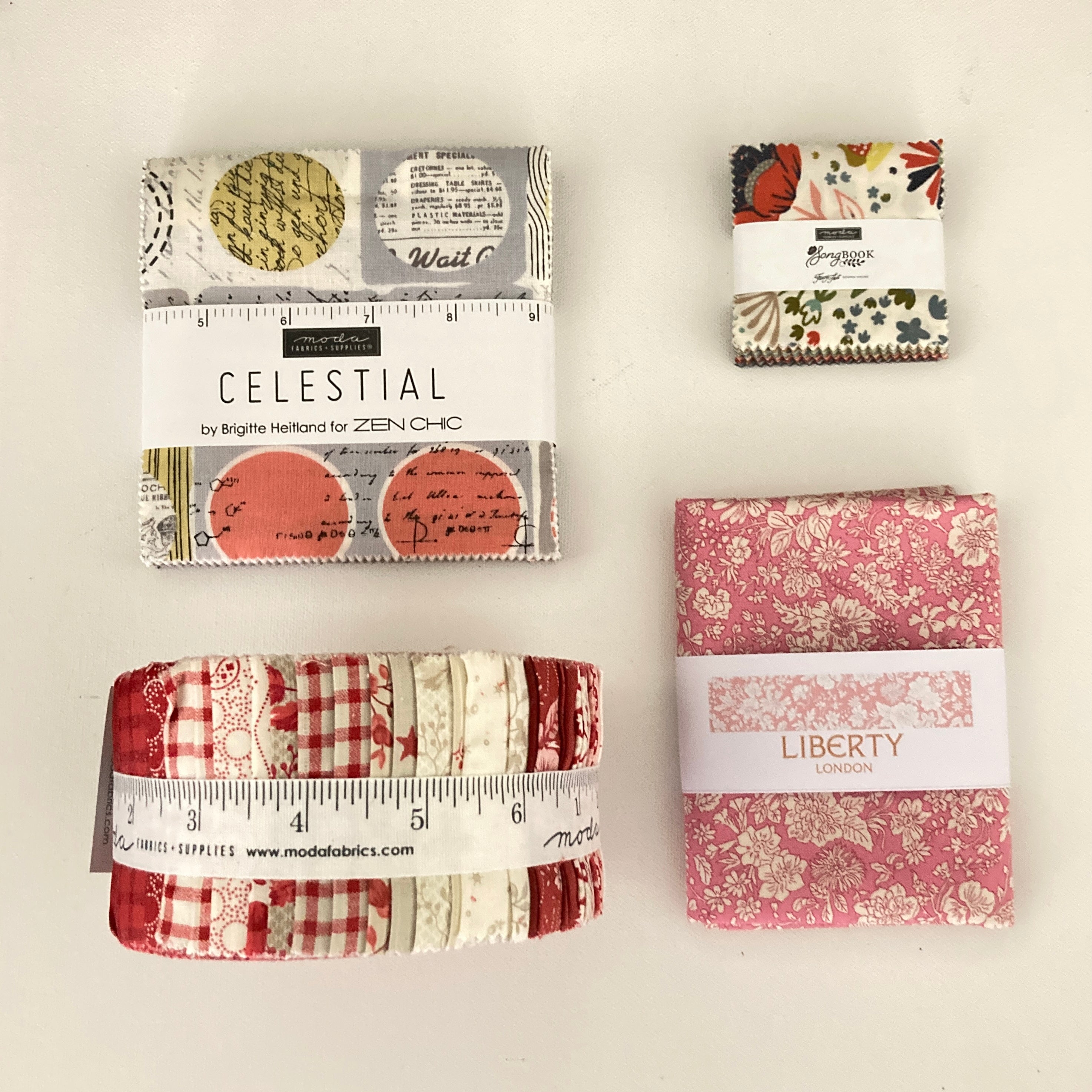 Billede af precuts; charm pack, candy, jelly roll og fat quarter